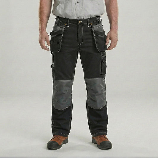 Worker wearing Bauskydd B128 cargo work pants on a job site